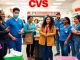 Diverse CVS employees working together in a store.