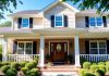 A charming home with a welcoming front porch.