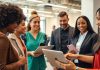 Diverse professionals networking in a modern office setting.