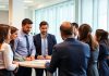 Diverse professionals collaborating in a modern office setting.